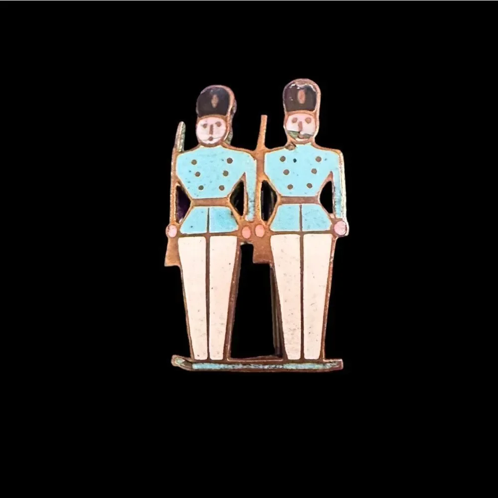 Vintage enamel on gold tone metal soldiers pin brooch
